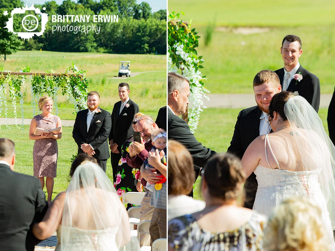 Heartland-Crossing-wedding-ceremony-photographer-arbor-flower-hanging.jpg