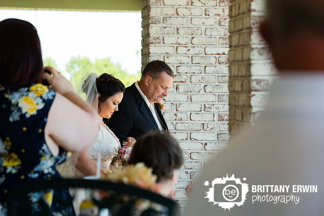 Wedding-ceremony-photographer-bride-walking-down-aisle-with-father.jpg