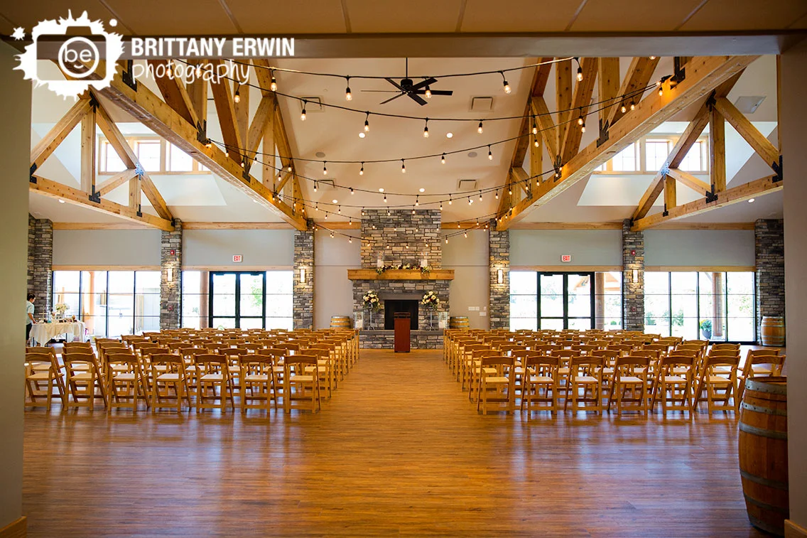 Sycamore-at-Mallow-Run-ceremony-location-indoor-fireplace-wooden-chairs.jpg
