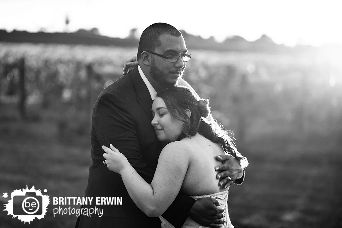 Indianapolis-wedding-portrait-photographer-sunset-vineyard-mallow-run-winery-couple-hug.jpg