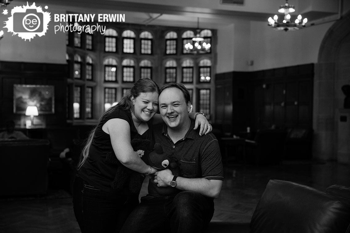 Bloomington-Indiana-University-engagement-portrait-photographer-couple-in-union-building-laughing.jpg