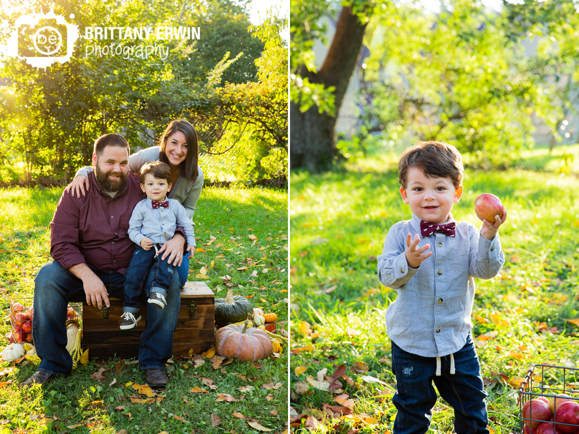 Indianapolis-fall-mini-session-photographer-family-portrait-outside-leaves-with-apples.jpg