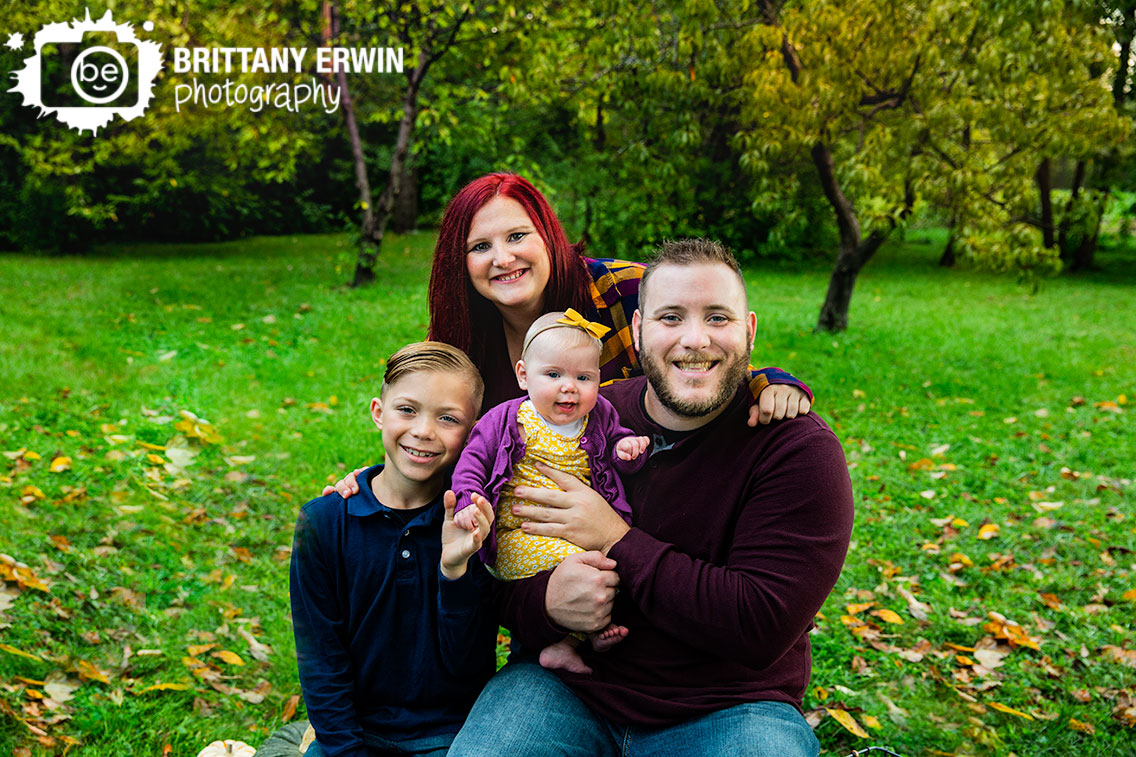 Indianapolis-family-portrait-photographer-baby-girl-big-brother-yellow-bow-group-leaves.jpg