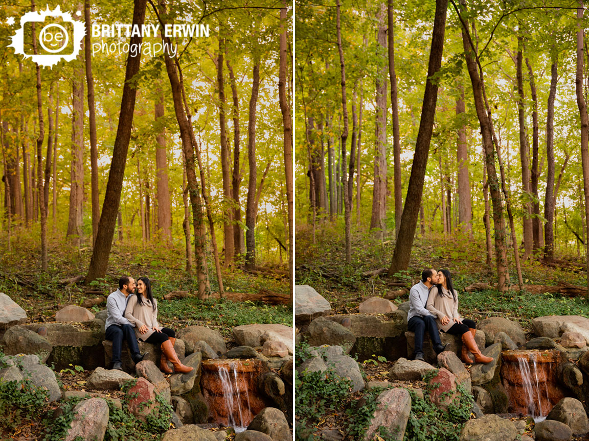 autumn-forest-waterfall-couple-on-ledge-engagement-portrait-photographer.jpg