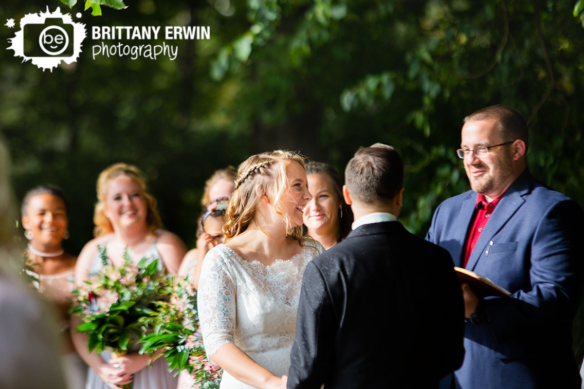 Wedding-photographer-bride-laughing-fun-ceremony-outdoor-orchard.jpg