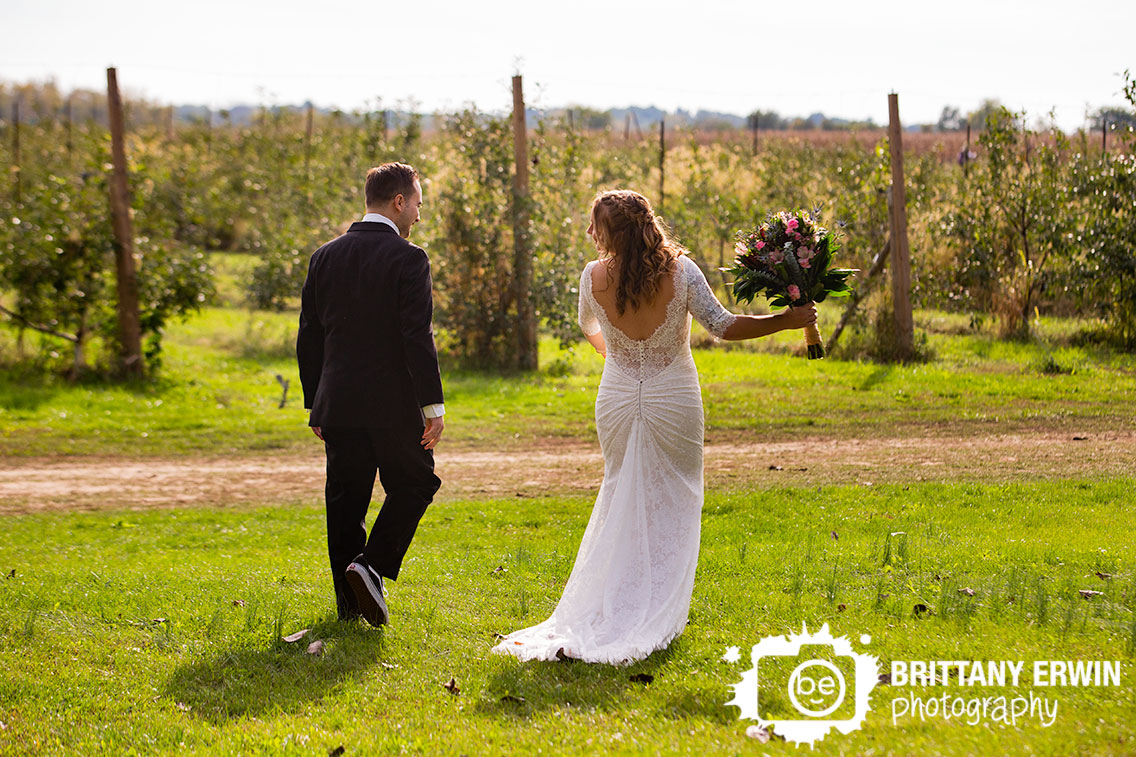 Lafayette-Indiana-orchard-wedding-photographer-husband-wife-exit.jpg