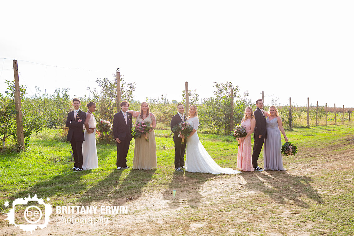 Wea-Creek-Orchard-wedding-photographer-bridal-party-group-apple-tree-field.jpg