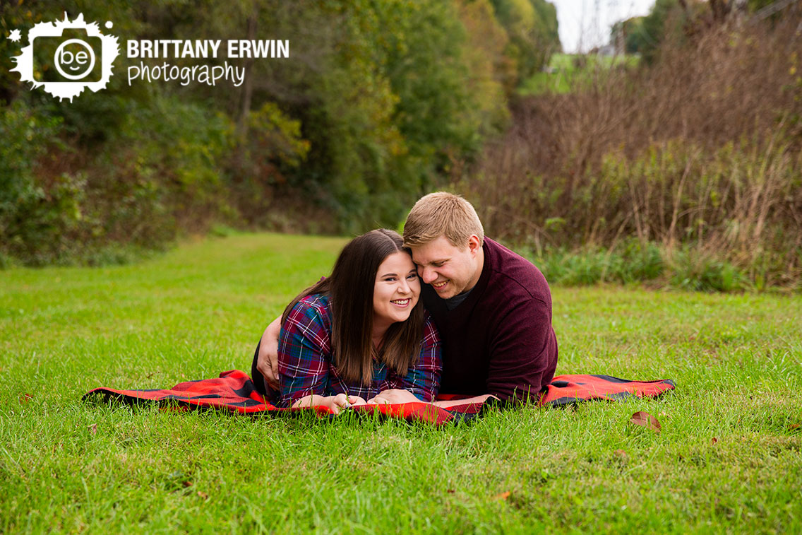 camby-Indiana-engagement-portrait-photographer-couple-on-picnic-blanket-fall-session.jpg