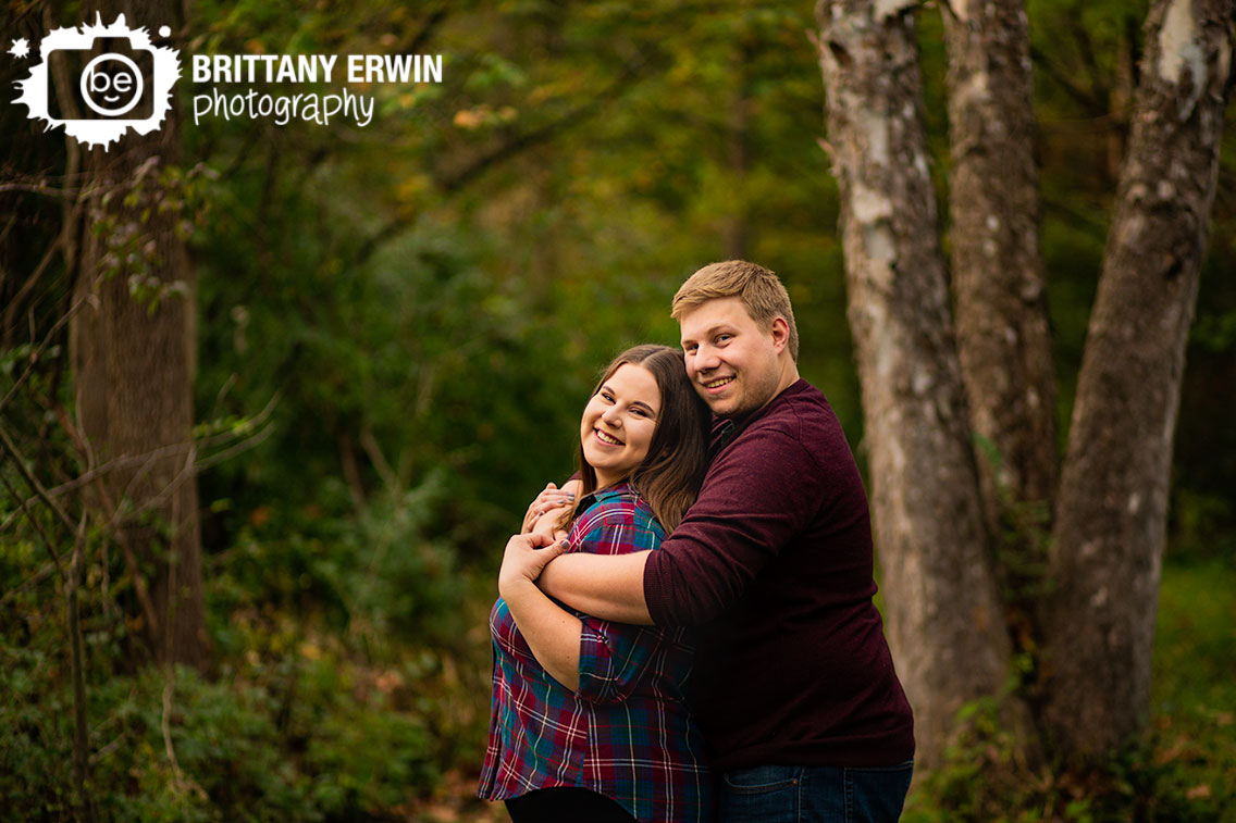 Indianapolis-engagement-photographer-couple-peeling-birch-tree-fun-hug-in-fall.jpg
