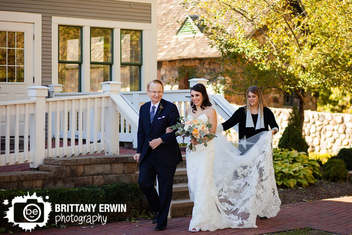 Historic-Ambassador-House-wedding-ceremony-bride-walking-down-with-father-molly-myrtle-bouquet.jpg