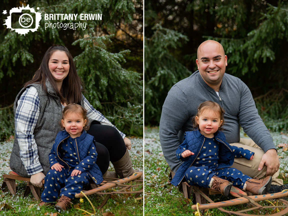 Family-portrait-photographer-winter-snow-sled-toddler-girl-with-mother-father.jpg