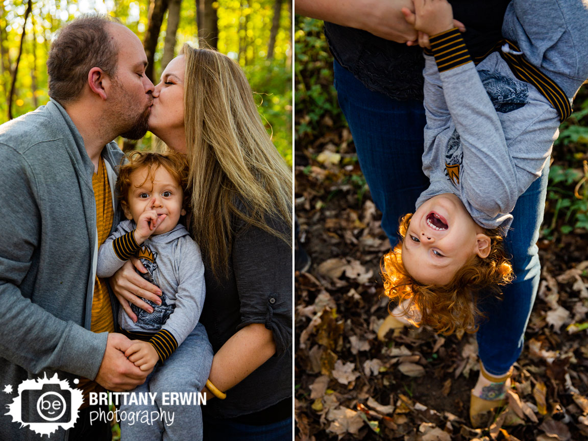 Indianapolis-portrait-photographer-parents-kiss-toddler-upside-down-fun.jpg
