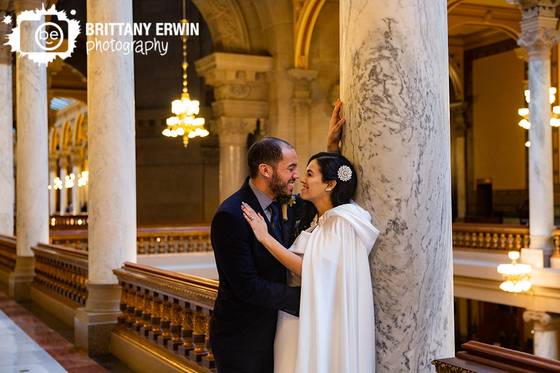 Indiana-State-House-elopement-couple-on-balcony-rail-portrait.jpg