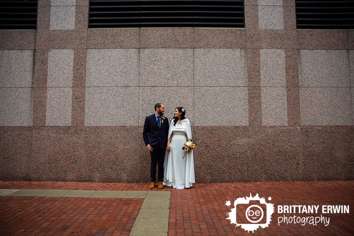 Downtown-Indianapolis-granite-wall-stone-couple-elopement-portrait.jpg