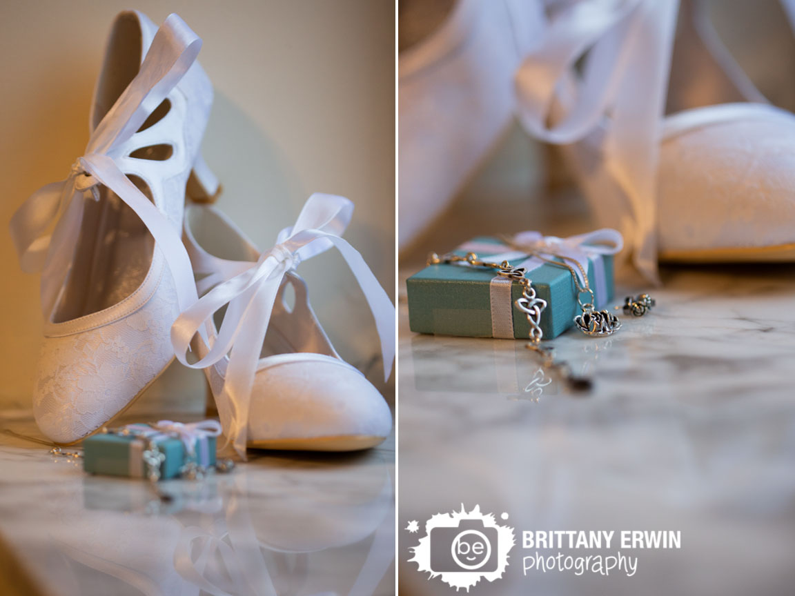 Indianapolis-wedding-photographer-white-lace-shoes-bride-details-earrings-necklace-on-marble.jpg