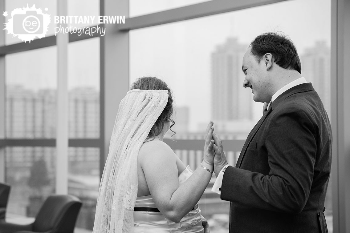 Indianapolis-wedding-photographer-bride-and-groom-hold-hands-after-first-look.jpg