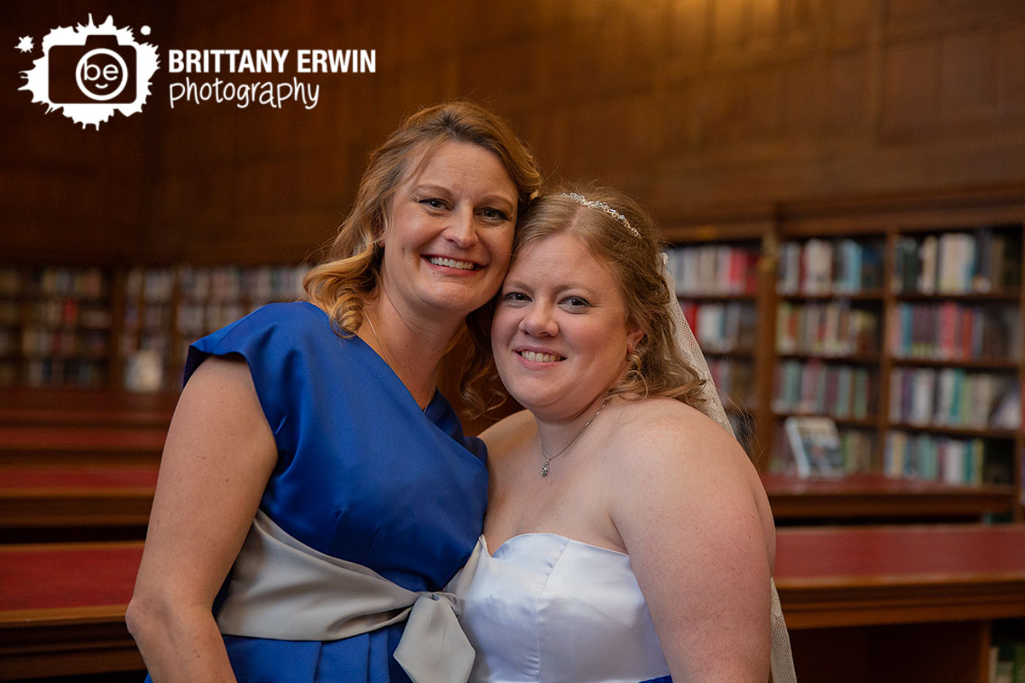 Indianapolis-wedding-photographer-bride-with-maid-of-honor-central-library-in-simon-reading-room.jpg