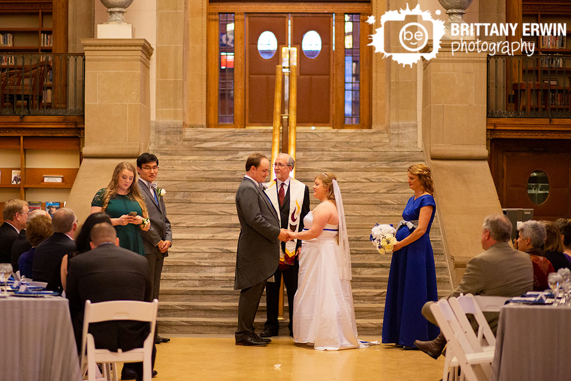 Indianapolis-wedding-photographer-central-library-sister-of-groom-reading-at-altar.jpg
