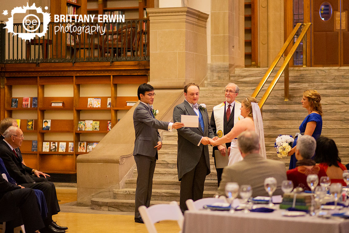 Indianapolis-central-library-downtown-Indy-wedding-ceremony-photography-groom-reading-vows.jpg