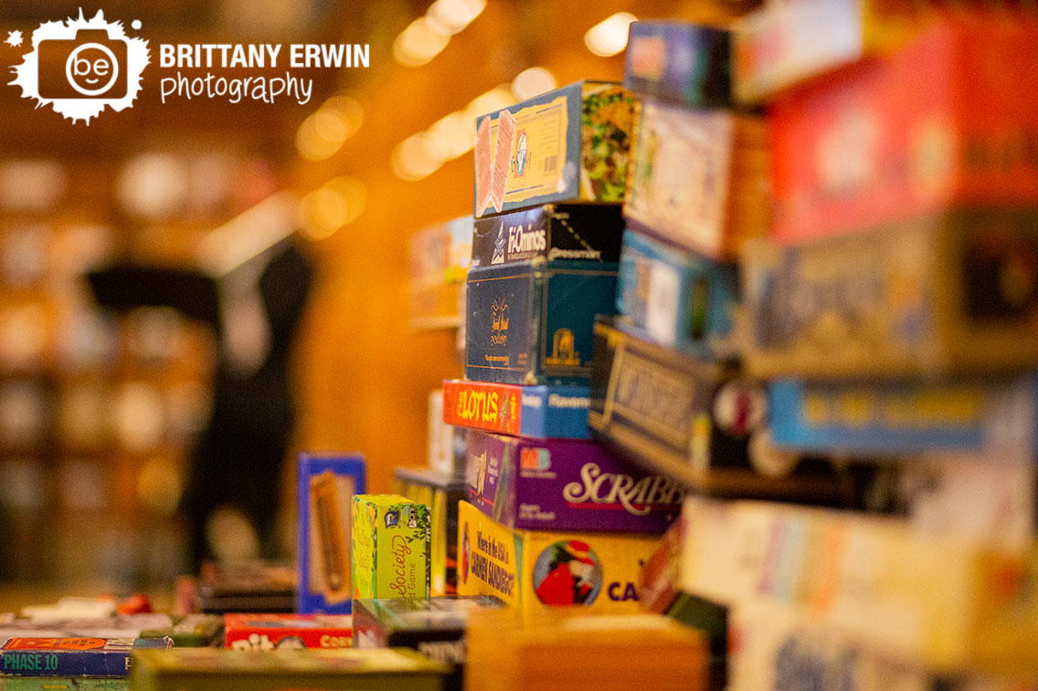 Indianapolis-wedding-photographer-central-library-board-game-selection-reception-table.jpg