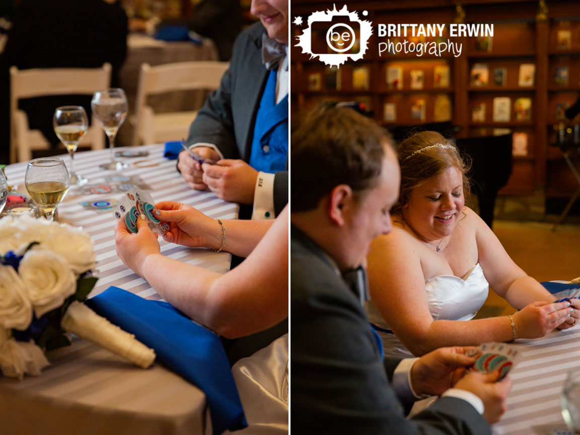 Indianapolis-central-library-wedding-photographer-reception-first-game-cards-sweetheart-table.jpg