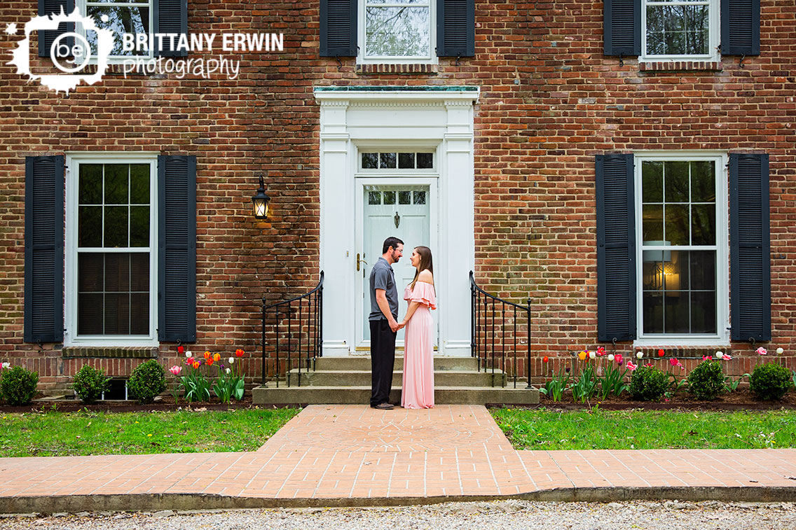 Danville-Indiana-engagement-portrait-photographer-couple-blanton-house-front-tulip-spring.jpg