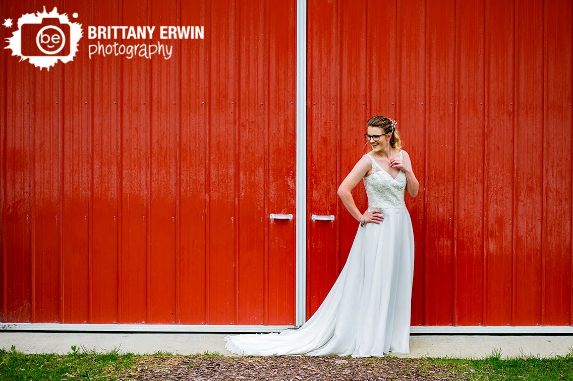 Bridal-portrait-red-barn-door-rustic-gatherings-wedding-venue.jpg