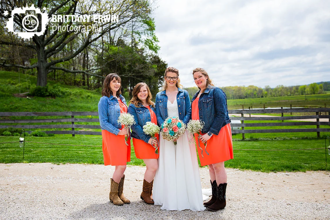 Bride-with-bridesmaid-portrait-group-outside-rustic-gatherings-pink-dress-jean-jacket.jpg