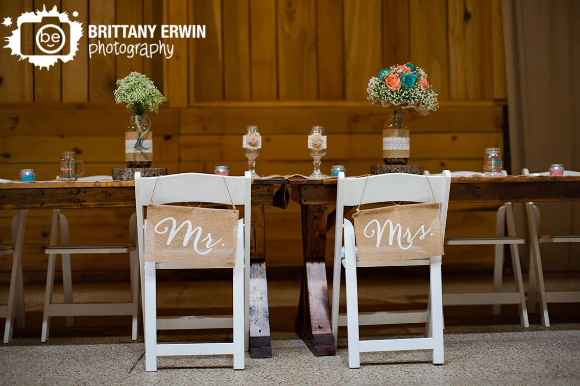 Indiana-wedding-photographer-mr-mrs-burlap-chair-banner-babys-breath-flower-centerpiece-bouquet.jpg