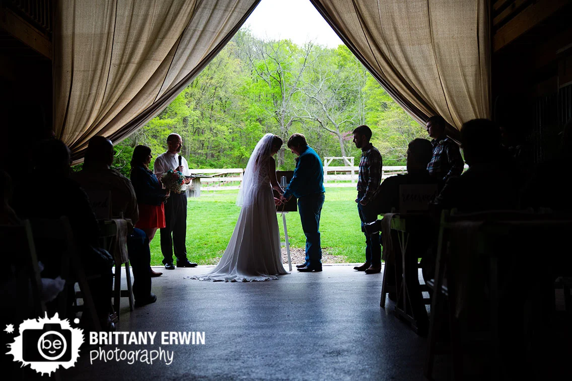 Indiana-wedding-photographer-unity-ceremony-silhouette-couple-braiding-cords.jpg