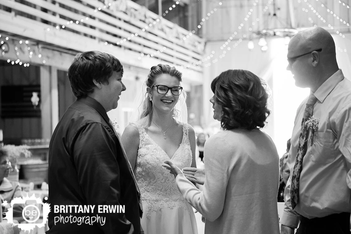 bride-and-groom-greet-mother-and-father-of-bride-wedding-reception.jpg