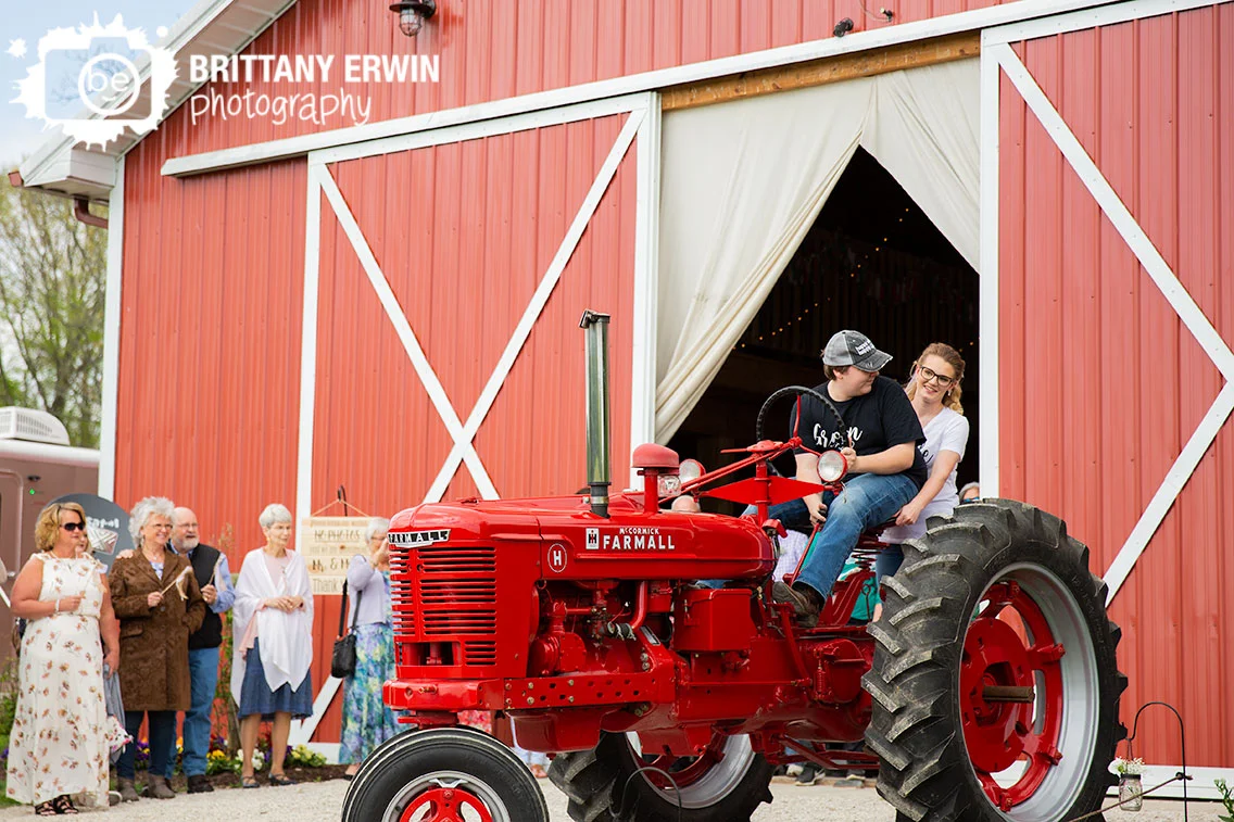 Indiana-wedding-photographer-couple-ride-farmall-tractor-getaway-exit.jpg