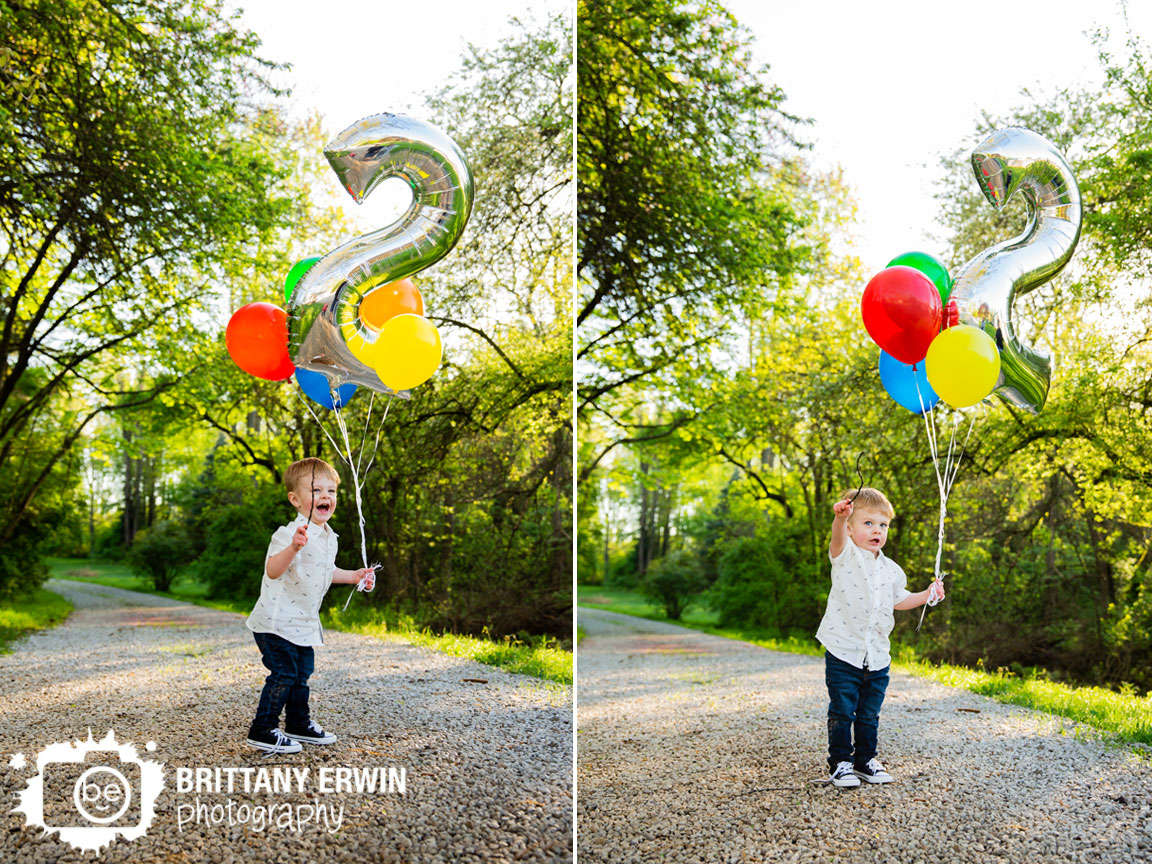 Indianapolis-portrait-photographer-toddler-boy-birthday-2-balloon-stick-casting-spell.jpg