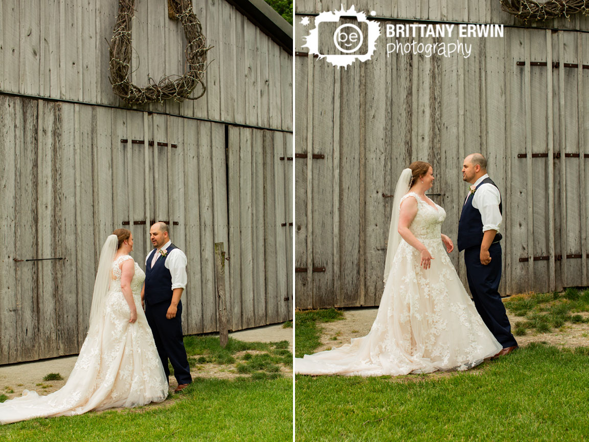 First-look-wedding-photographer-couple-in-front-of-barn-at-Hidden-Brook-Acres.jpg