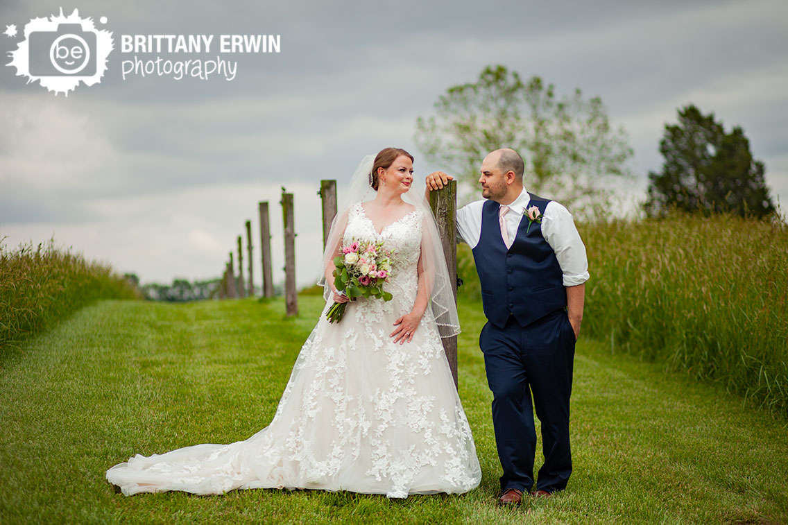 Shelbyville-Indiana-wedding-photographer-couple-on-fence-path-bride-groom-portrait.jpg