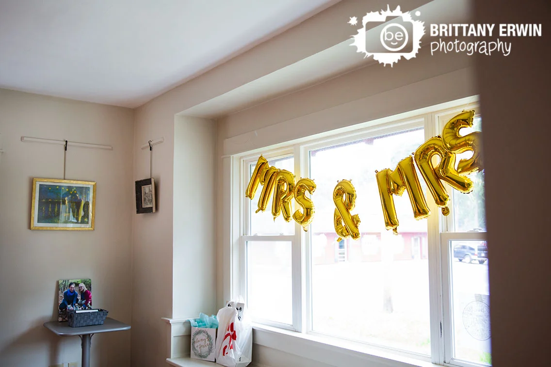 mrs-lgbt-wedding-balloons-in-window.jpg