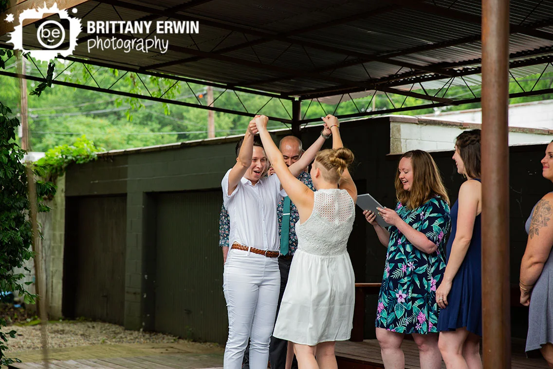 Couple-cheer-welcome-indianapolis-wedding-ceremony-photographer.jpg