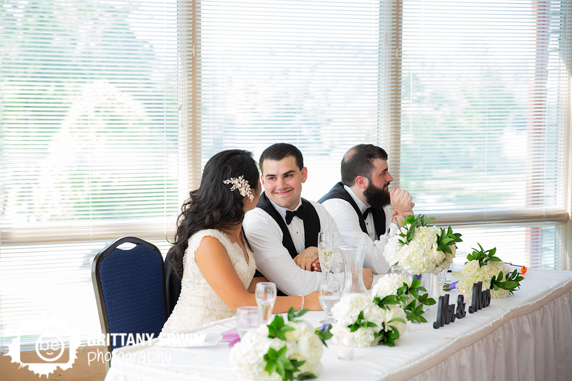 groom-reaction-during-toasts-reception-photographer.jpg