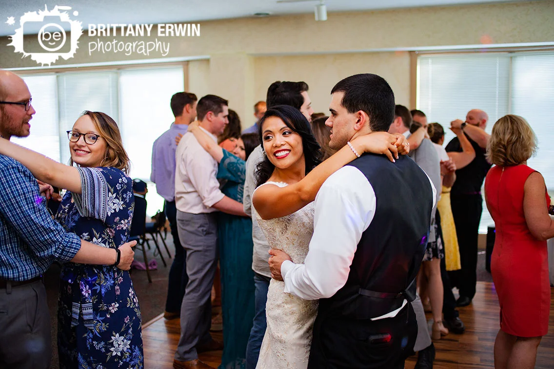 bride-groom-dancing-on-dance-floor-wedding-reception.jpg