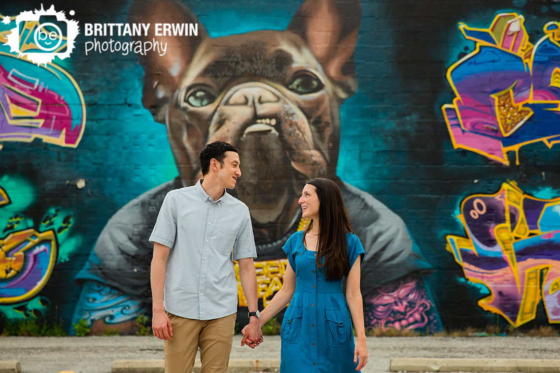 Indiana-engagement-portrait-photographer-couple-walking-dog-mural-fountain-square.jpg