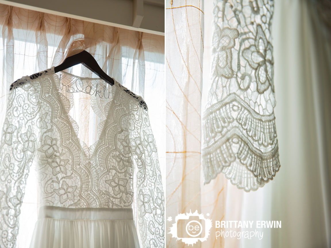 custom-hanger-bride-bridal-gown-dress-in-window-lace-sleeves.jpg
