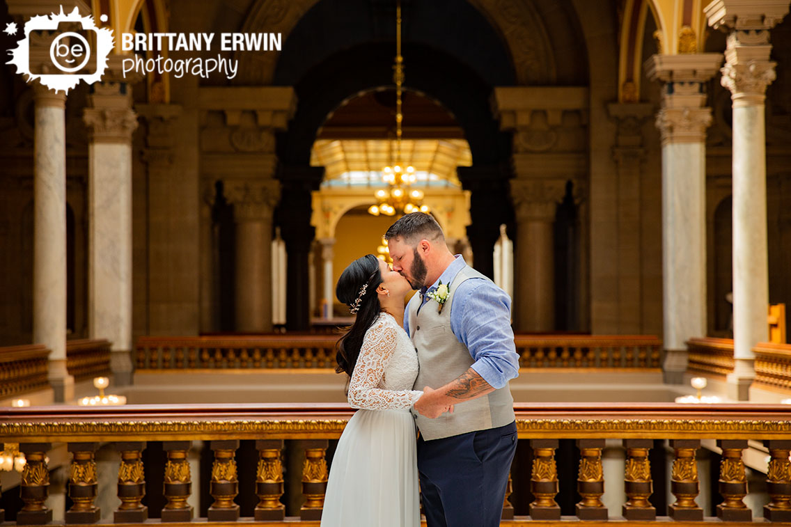 Indianapolis-elopement-photographer-ceremony-at-state-house-first-kiss-husband-and-wife.jpg