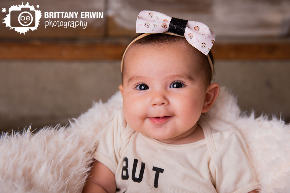 baby-girl-milk-cookies-bow-milestone-portrait.jpg