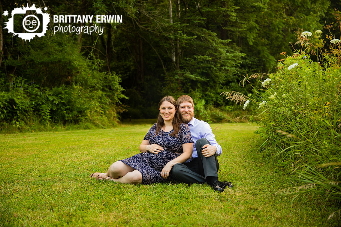maternity-portrait-photographer-outside-summer-couple-in-grass-country-setting.jpg