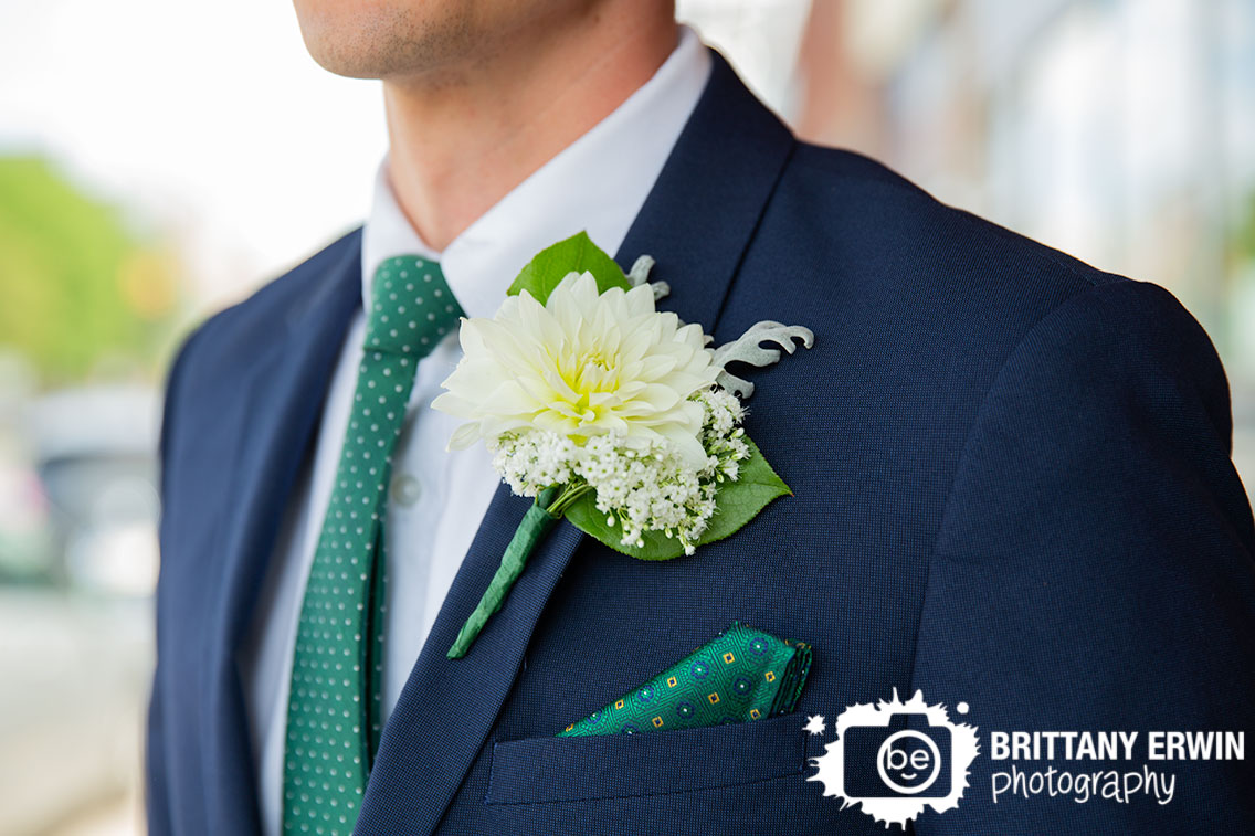 Fountain-Square-Indiana-wedding-photographer-groom-suit-green-tie-daliah-boutonniere.jpg