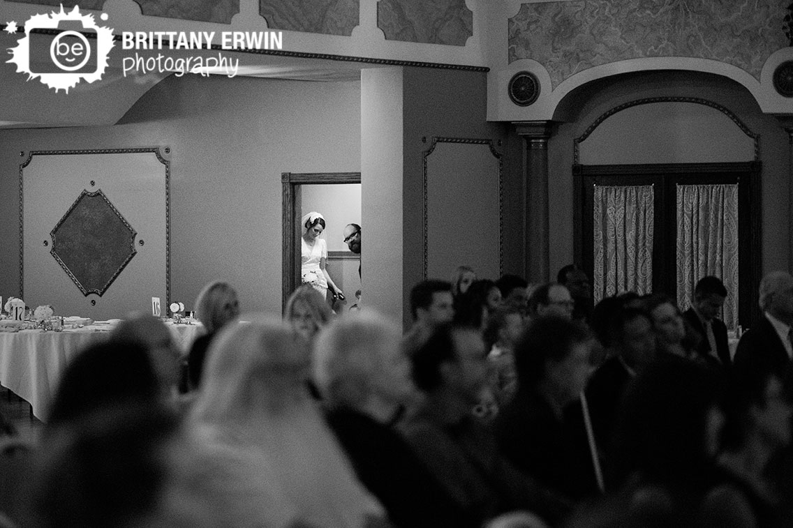 Bride-waiting-to-walk-down-aisle-in-stairwell-at-Fountain-Square-Theatre.jpg