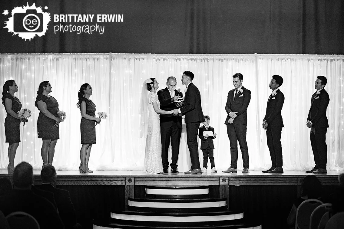 Wedding-ceremony-photographer-bride-laughing-reaction-vows-on-stage.jpg