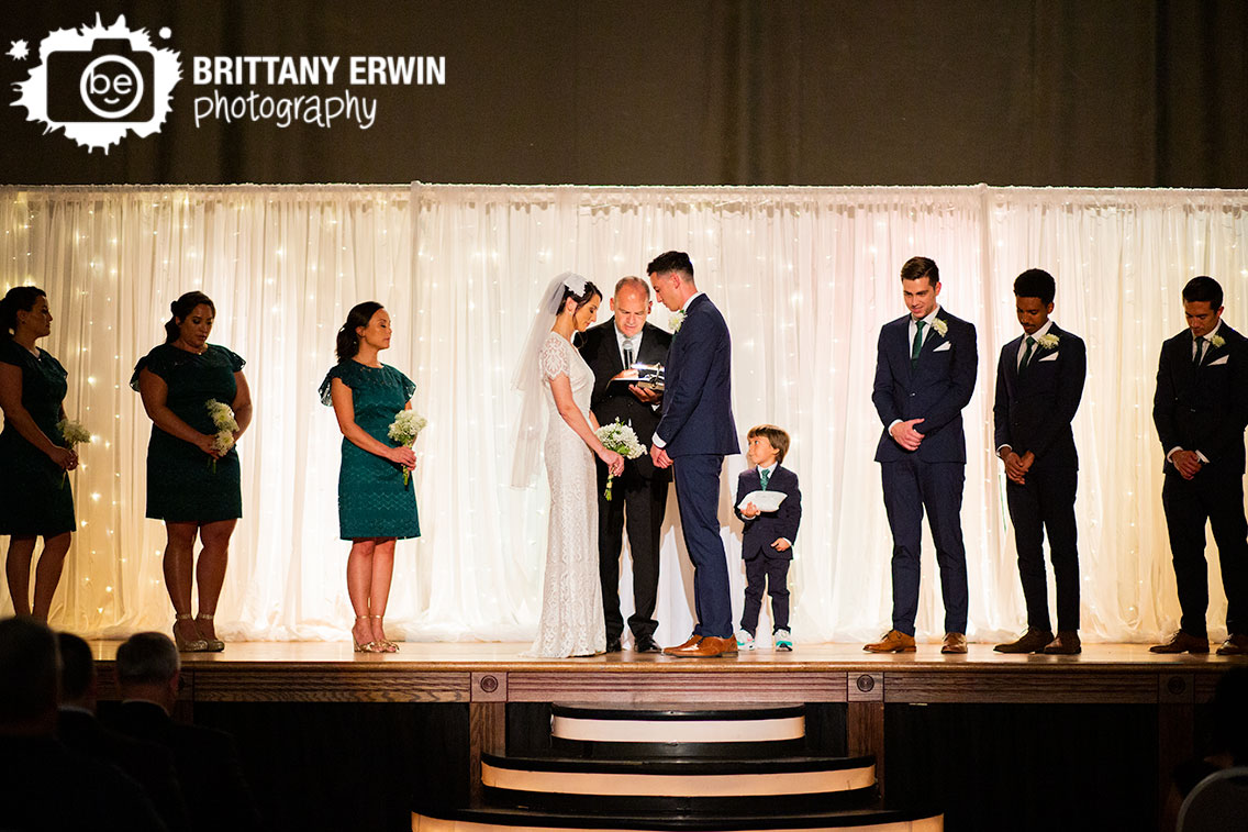 Fountain-Square-wedding-ceremony-photographer-couple-spot-light-prayer.jpg