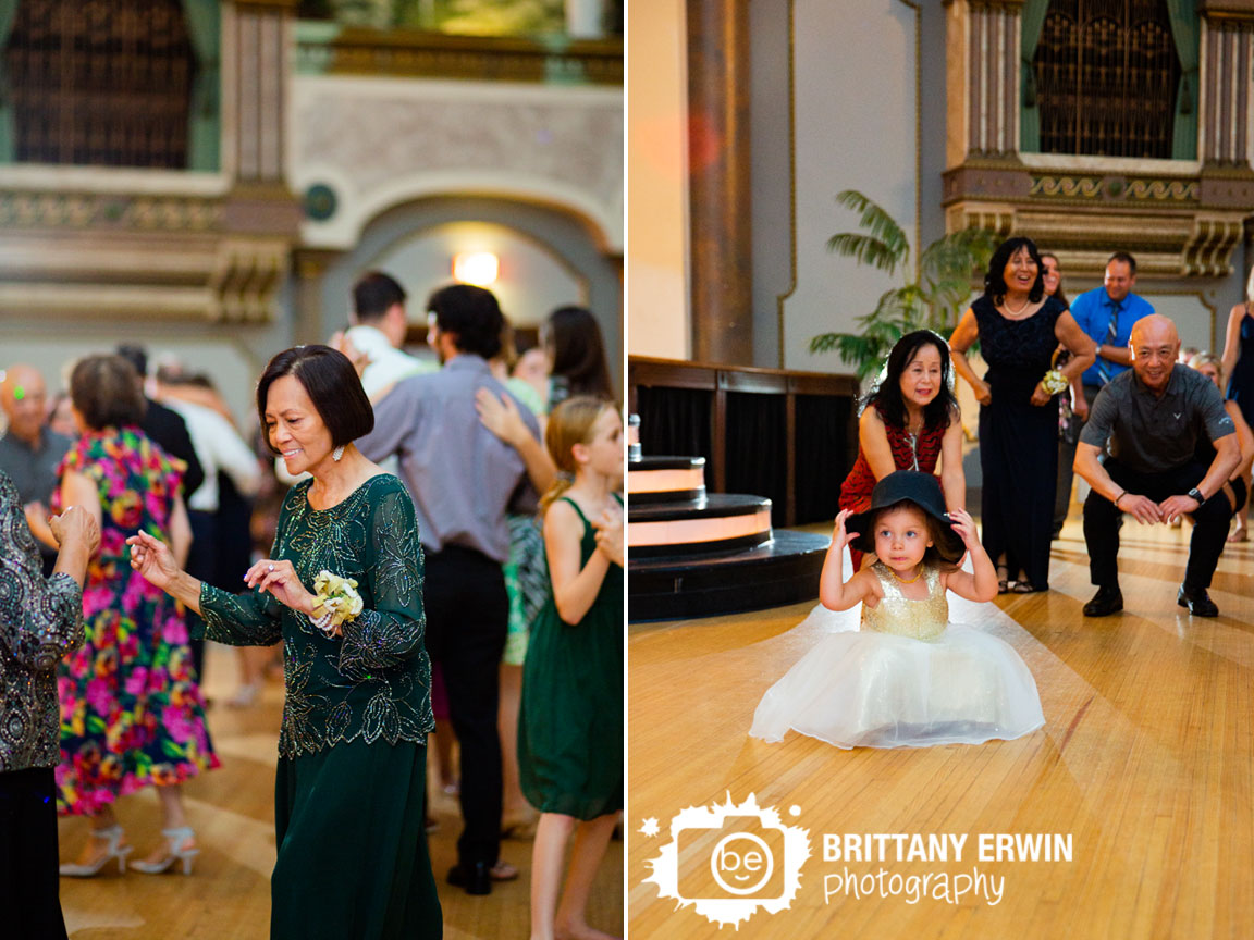 Wedding-Reception-dance-floor-flower-girl-dancing-with-hat.jpg