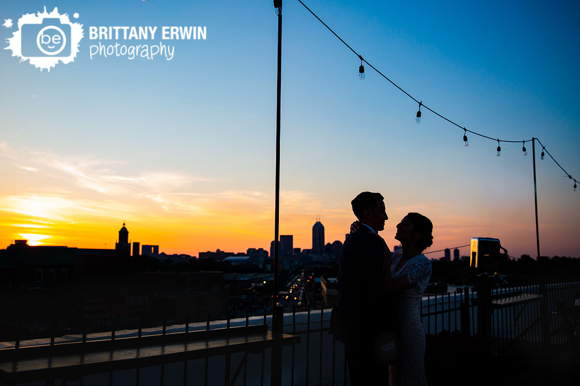 Fountain-Square-Theater-wedding-photographer-roof-top-couple-skyline-sunset-golden-hour-silhouette-Indianapolis.jpg